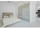 Bright bedroom with sleek, modern design and built-in closet at 115 Solana St, North Port, FL 34287