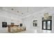Open kitchen with modern appliances, a large island, and comfortable seating at 115 Solana St, North Port, FL 34287