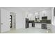 Contemporary kitchen with stainless steel appliances and modern cabinetry at 115 Solana St, North Port, FL 34287