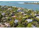 A scenic view of waterfront neighborhood featuring lush greenery and beautiful waterways leading to the bay at 123 Faubel St, Sarasota, FL 34242