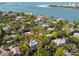 A scenic view of waterfront neighborhood featuring lush greenery and beautiful waterways leading to the bay at 123 Faubel St, Sarasota, FL 34242