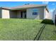 Expansive backyard with lush green grass, providing ample space for outdoor activities and enjoyment at 13393 Golden Lime Ave, Spring Hill, FL 34609