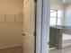 Bathroom view from closet at 13393 Golden Lime Ave, Spring Hill, FL 34609