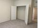 Bedroom features a carpeted floor and a closet with an open door at 13393 Golden Lime Ave, Spring Hill, FL 34609