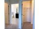 Hallway view to bathroom and closet at 13393 Golden Lime Ave, Spring Hill, FL 34609