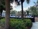 Community playground with slides, climbing structures, and swings amid lush landscaping and mature trees at 13393 Golden Lime Ave, Spring Hill, FL 34609