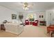 Bright living room featuring neutral tones, a large window, and comfortable seating at 1354 Lucaya Ave, Venice, FL 34285