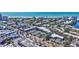 Aerial view of a condo complex with a red roof in a thriving community with many shops, restaurants, and near the beach at 137 Avenida Messina # 3, Sarasota, FL 34242