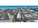 Aerial view of condo with red roof situated in an amazing community near the beach, restaurants, and shops at 137 Avenida Messina # 3, Sarasota, FL 34242