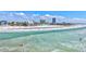 Beautiful beach view with clear water, white sand, and blue skies. Perfect for vacationing or enjoying the coastal lifestyle at 137 Avenida Messina # 3, Sarasota, FL 34242