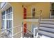 View of the well-maintained stairs, landings, and entry doors of the condo at 137 Avenida Messina # 3, Sarasota, FL 34242
