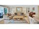 Inviting living room with comfortable seating, stylish decor, and natural light at 137 Avenida Messina # 3, Sarasota, FL 34242
