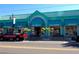 Commercial building in Siesta Key with colorful awnings, housing souvenir, jewelry, and surf shops at 137 Avenida Messina # 3, Sarasota, FL 34242