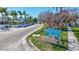 Street view with tropical landscaping, palm trees, and nearby parking at 137 Avenida Messina # 3, Sarasota, FL 34242