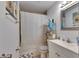 Bathroom featuring a shower, vanity, mirror, and toilet at 1410 24Th E Ave, Bradenton, FL 34208