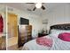 Bedroom featuring a double bed, ceiling fan, and closet at 1410 24Th E Ave, Bradenton, FL 34208