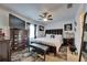 Well-lit bedroom features dark wood furnishings, stylish decor and plush carpeting at 1410 24Th E Ave, Bradenton, FL 34208