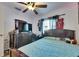 This bedroom features a ceiling fan and a window for natural light at 1410 24Th E Ave, Bradenton, FL 34208