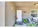 Inviting front porch with decorative accents, plants, and outdoor seating area at 1410 24Th E Ave, Bradenton, FL 34208