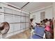 Organized garage space, with a clean gray door and ample storage for tools and accessories at 1410 24Th E Ave, Bradenton, FL 34208