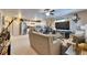 Cozy living room showcasing an open layout with a modern kitchen, ideal for Gathering gatherings at 1410 24Th E Ave, Bradenton, FL 34208