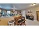 Open concept living and dining area with bar seating and decorative accents at 1410 24Th E Ave, Bradenton, FL 34208