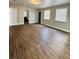 Large bedroom with hardwood floors, neutral walls and natural lighting at 1421 8Th E Ave, Bradenton, FL 34208