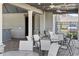 Community patio with seating areas and tables, providing residents a space to relax and socialize at 14355 59Th E Cir, Bradenton, FL 34211
