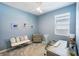 Inviting home office featuring a desk, comfortable seating, and serene decor for a productive workspace at 14355 59Th E Cir, Bradenton, FL 34211