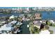 Panoramic aerial view of waterfront homes with canals, private docks, and ocean access at 1633 Ridgewood Ln, Sarasota, FL 34231