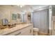 Stylish bathroom featuring granite countertops, modern fixtures, and decorative accents at 1633 Ridgewood Ln, Sarasota, FL 34231