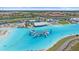Community's incredible aqua park features slides and floats on a crystal-clear blue lagoon, offering endless fun at 16810 Scuba Crest St, Wimauma, FL 33598