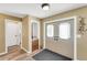 Foyer featuring neutral wall paint, hardwood flooring, a double door entrance, and a small alcove at 1714 Coral Sands Ct, Venice, FL 34293