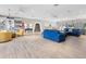 Spacious clubhouse with ample seating, bookcases, and stylish decor at 2526 Clubhouse Dr # 203, Sarasota, FL 34232