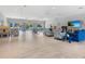 Bright clubhouse area with plenty of seating options and views of the outdoors at 2526 Clubhouse Dr # 203, Sarasota, FL 34232