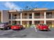 Well-maintained condo building with parking spots in front for residents and visitors at 2526 Clubhouse Dr # 203, Sarasota, FL 34232