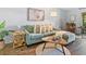 Inviting living room features a comfortable couch, wood floors, and stylish décor at 2526 Clubhouse Dr # 203, Sarasota, FL 34232