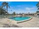 A refreshing community pool with lounge chairs offers a perfect spot for relaxation at 2851 Swifton Dr # 39, Sarasota, FL 34231