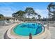 A refreshing community pool with lounge chairs offers a perfect spot for relaxation at 2851 Swifton Dr # 39, Sarasota, FL 34231