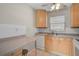 A well-lit kitchen offers essential appliances and ample countertop space at 2851 Swifton Dr # 39, Sarasota, FL 34231