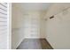 This walk-in closet maximizes space with wire shelving, offering ample storage and organization options at 4223 Oakhurst E Cir # 3025, Sarasota, FL 34233