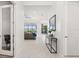 Bright foyer with marble floors offering seamless transition into the spacious living area at 4790 Pastel Ct, Sarasota, FL 34240