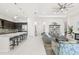 Bright, open-concept living space featuring a modern kitchen, sleek finishes, and stylish decor at 4790 Pastel Ct, Sarasota, FL 34240