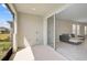 Spacious patio, blending indoor and outdoor living, with a view that extends into the home's living area at 5675 Equator Ct, Nokomis, FL 34275