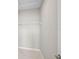 Walk-in closet with wire shelving and marble tile flooring at 5675 Equator Ct, Nokomis, FL 34275