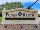 Elegant Palmer Ranch community sign with decorative accents at 5709 Sunflower Cir, Sarasota, FL 34238