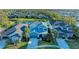 A beautiful blue two-story home in a residential neighborhood at 5709 Sunflower Cir, Sarasota, FL 34238