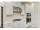 Stylish kitchen with stainless steel appliances, white subway tile, and gas range cooktop at 5709 Sunflower Cir, Sarasota, FL 34238