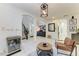 Bright living room featuring an open layout, modern lighting, and stylish furnishings at 5709 Sunflower Cir, Sarasota, FL 34238