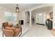 Spacious open-concept living area with modern decor and hardwood floors at 5709 Sunflower Cir, Sarasota, FL 34238